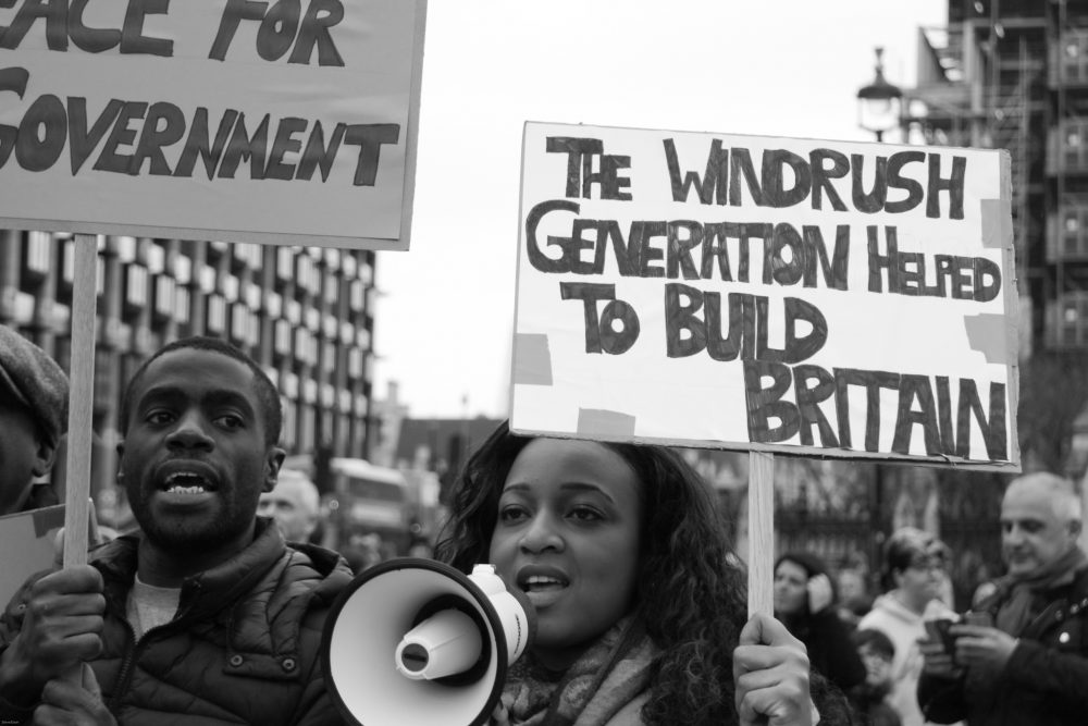 Woman and man at Windrush protest