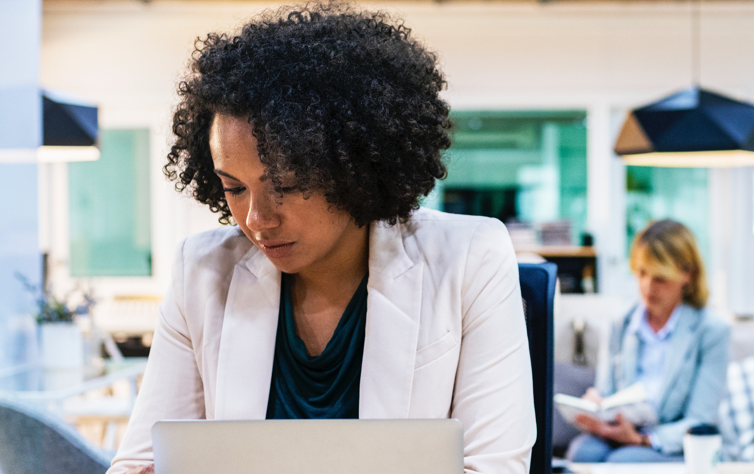 a woman working in an office -workers' rights aren't part of the human rights convention