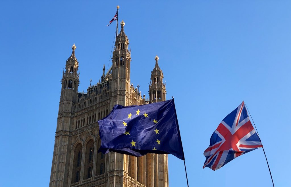 General Election: The European and UK flags blow in the wind outside parliament