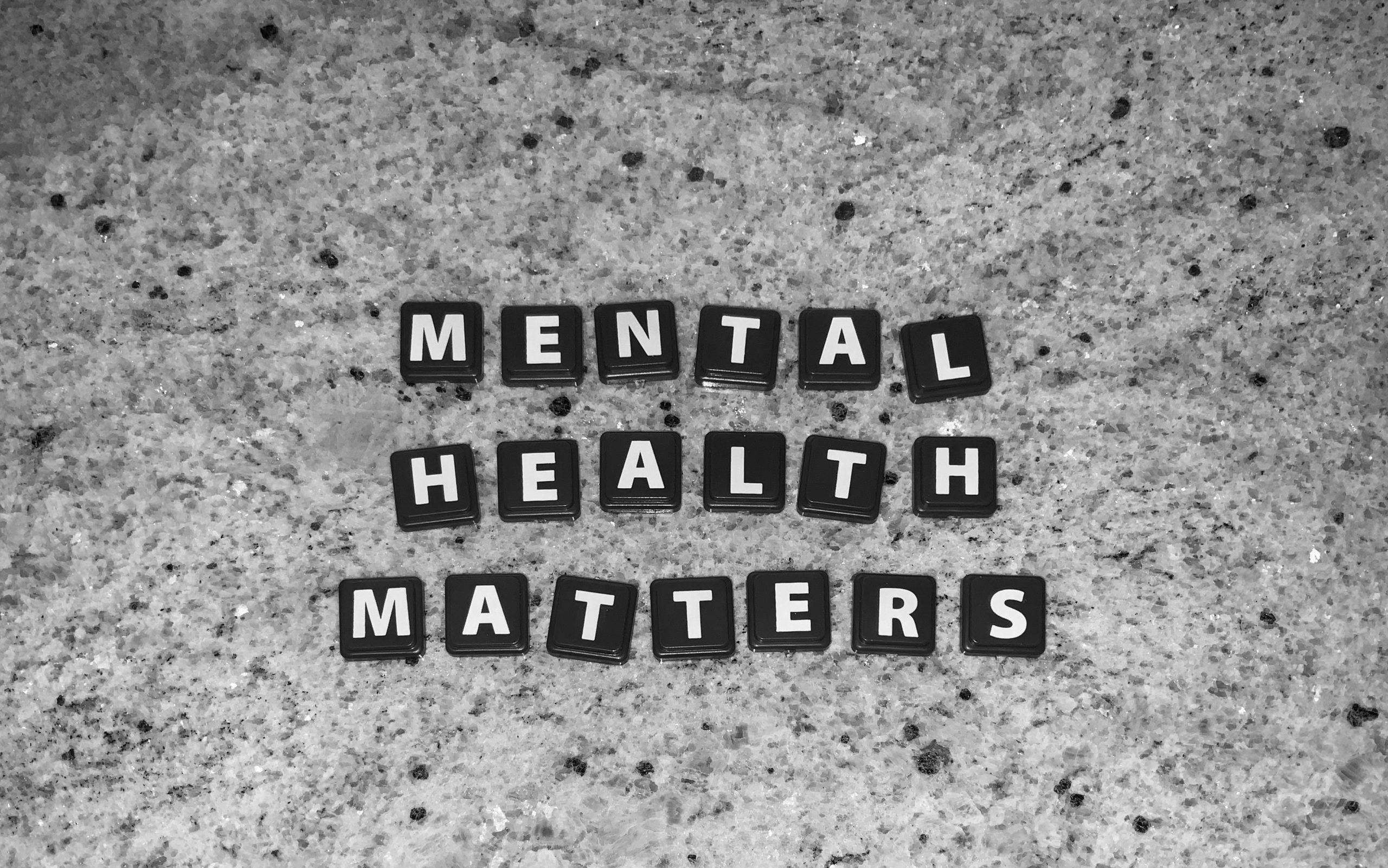 A series of letter blocks in white reads 'mental health matters'
