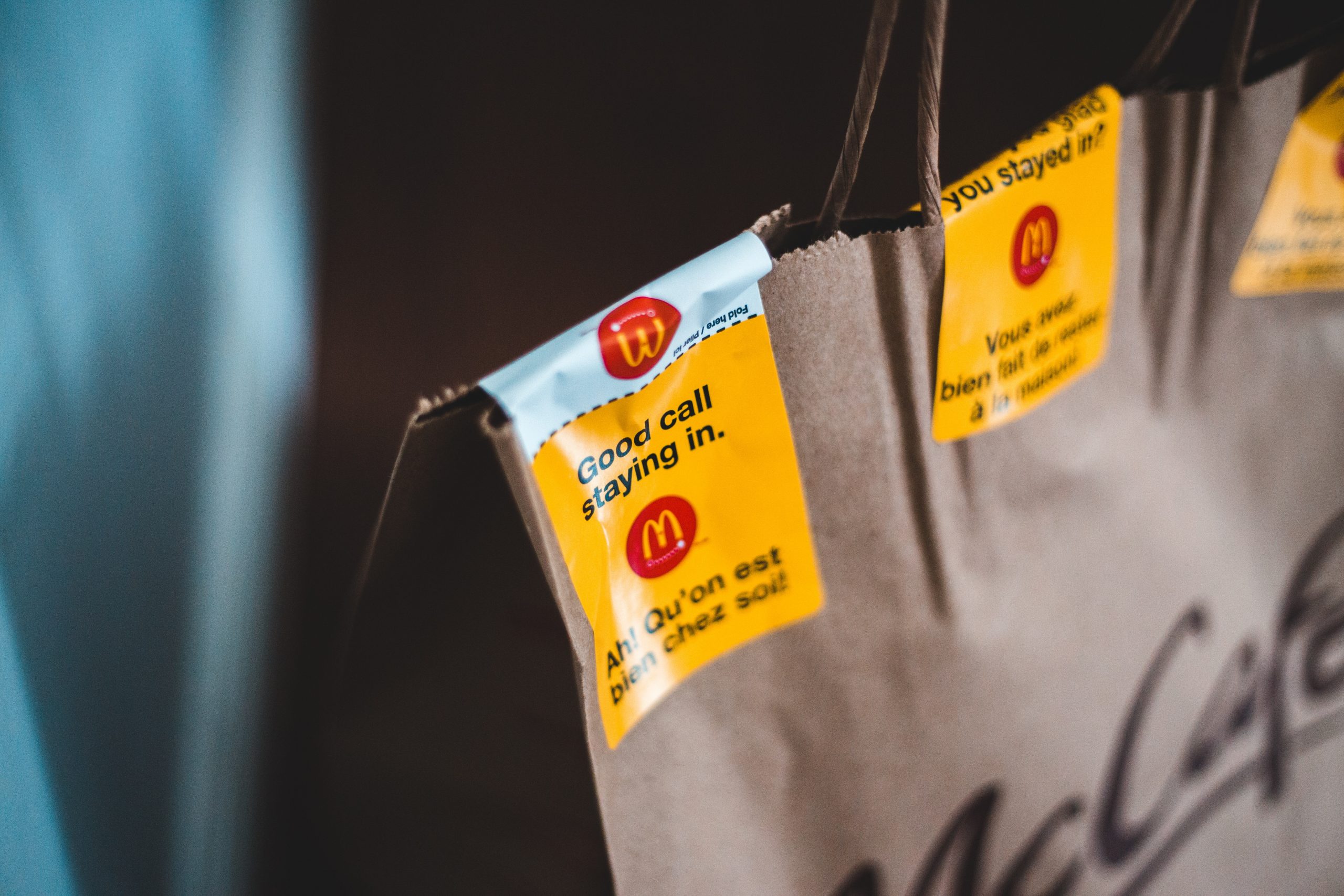 A close up of a McDonald's McCafe delivery bag