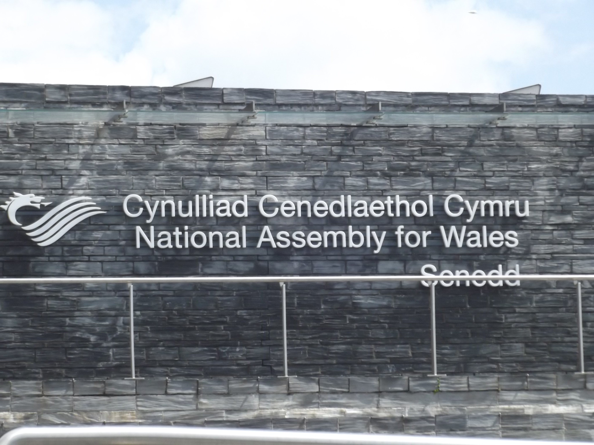 A sign outside the Welsh Assembly reads: 'National Assembly for Wales"