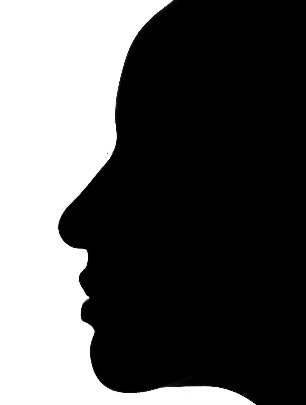 A black silhouette of the side profile of a woman's face against a white background.